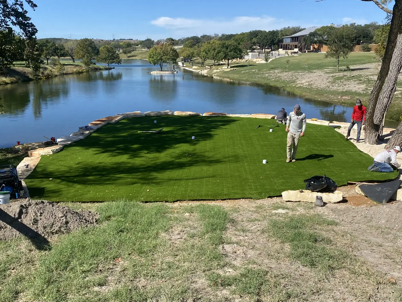 Backyard putting green on a lakefront property