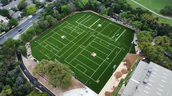 Aerial view of a full-size artificial turf sports field